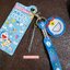 สายคล้องคอ/บัตร มีที่ห้อยมือถือตรงปลาย ลาย Go!Go! with Doraemon ขนาดสาย 100 x 1.5 ซม.