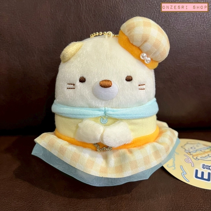พวงกุญแจตุ๊กตา Tenshi na Ebiten Idol (Limited) แบบ Neko ชุดสีเหลือง ขนาด 10 x 8 x 7 ซม. ไม่มีขายทั่วไป เป็นแบบต้องลุ้นกับทางหน้าร้าน San-X ที่ญี่ปุ่นเท่านั้น