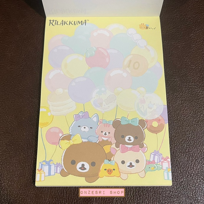 สมุดฉีก Rilakkuma Niko Niko Happy for You แบบสีเหลืองทอง ขนาด 14.8 x 10.5 ซม. มี 4 ลาย รวม 100 แผ่น