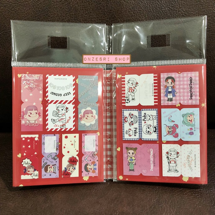 Post it / Sticky Note แบบเล่ม ลาย Fujiya Milky Peko สีแดง มี Sticker ที่สามารถทำเป็น index ได้ด้วย ขนาด 7 x 9 x 1 ซม. กระดาษ 13 ลาย รวม 260 แผ่น