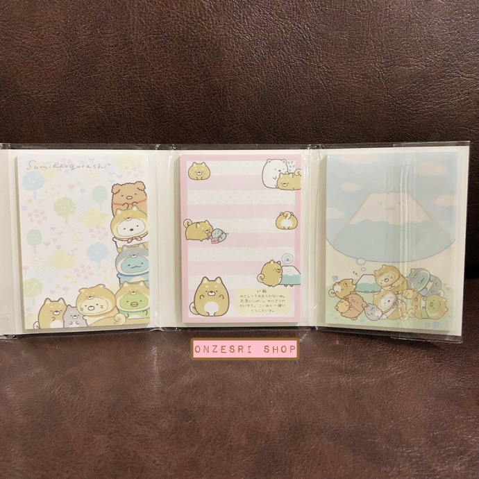 กระดาษโน้ต Memo แบบเล่มลาย Sumikko Gurashi - Dog Cosplay with Puppy สีชมพู มียางลบเล็ก 6 ก้อน ขนาด 9 x 7 x 1.8 ซม. กระดาษมี 6 ลาย รวม 120 แผ่น