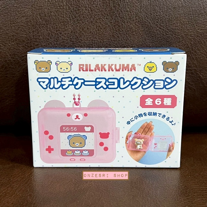 พวงกุญแจ Rilakkuma Gaming Collection - Multi-Case แบบ Game Console ด้านในเปิดทำเป็นกล่องใส่ของเล็ก ๆ ได้ ทำจาก ABS มี 6 แบบให้เลือกลุ้น ขนาด 7 x 9 x 4 ซม.