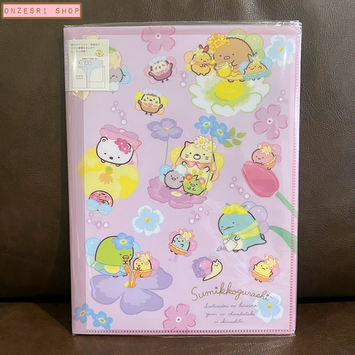 แฟ้ม A4 ลาย Sumikko Gurashi - Zassou in the Fairy Flower Garden สีชมพู ด้านในใส่เอกสารได้สองด้านซ้ายขวา เป็นแบบ pocket ใส่ได้ 10 ช่อง
