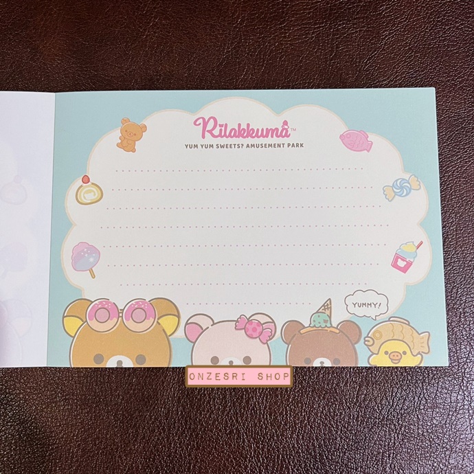 สมุดฉีก Rilakkuma Yum Yum Sweets? Amusement Park แบบสีฟ้า ขนาด 14.8 x 10.5 ซม. มี 4 ลาย รวม 100 แผ่น