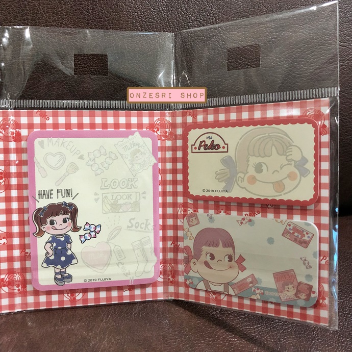 Post it / Sticky Note แบบเล่ม ลาย Fujiya Milky Peko สีแดง มี Sticker ที่สามารถทำเป็น index ได้ด้วย ขนาด 7 x 9 x 1 ซม. กระดาษ 13 ลาย รวม 260 แผ่น