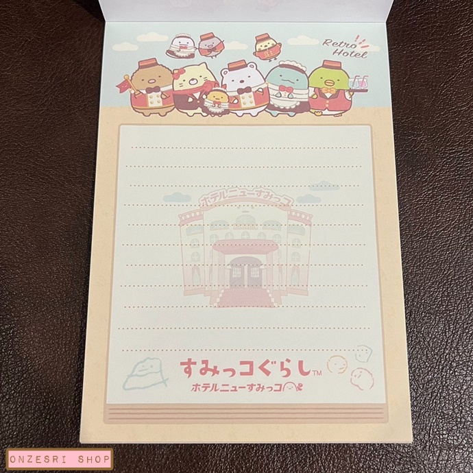 สมุดฉีก Sumikko Gurashi - Hotel New Sumikko แบบสีฟ้า ขนาด 14.8 x 10.5 ซม. มี 4 ลาย รวม 100 แผ่น 2 แผ่นแรกเป็นโปสการ์ด