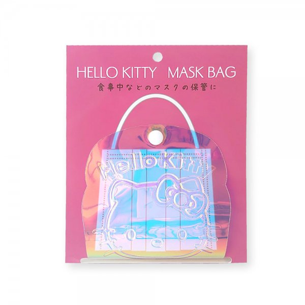Sanrio Mask Bag แบบ Hello Kitty (2nd) เป็นที่เก็บหน้ากากอนามัยแบบพับได้ ทำจาก TPU เป็นโฮโลแกรมวิ้ง ๆ มีกระดุมติด เวลาเก็บแล้วเอาสายหน้ากากมาทำเป็นหูกระเป๋า ขนาด 12 x 12 x 1.5 ซม.