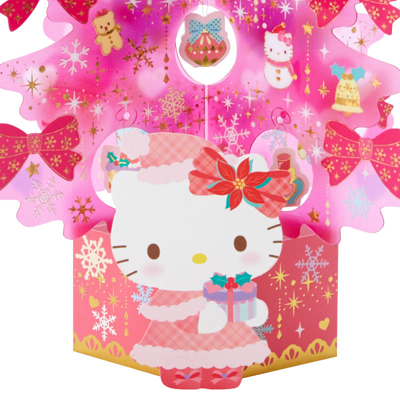 Sanrio Christmas Pop Up Card From Japan การ์ดอวยพรลาย Hello Kitty สีชมพู ทำจากพลาสติกแข็งใส กางออกมาเป็นต้นคริสต์มาสได้น่ารัก มีการ์ดกระดาษที่ไว้เขียนแนบมาให้ ขนาด 14.5 x 0.5 x 21.5 ซม.