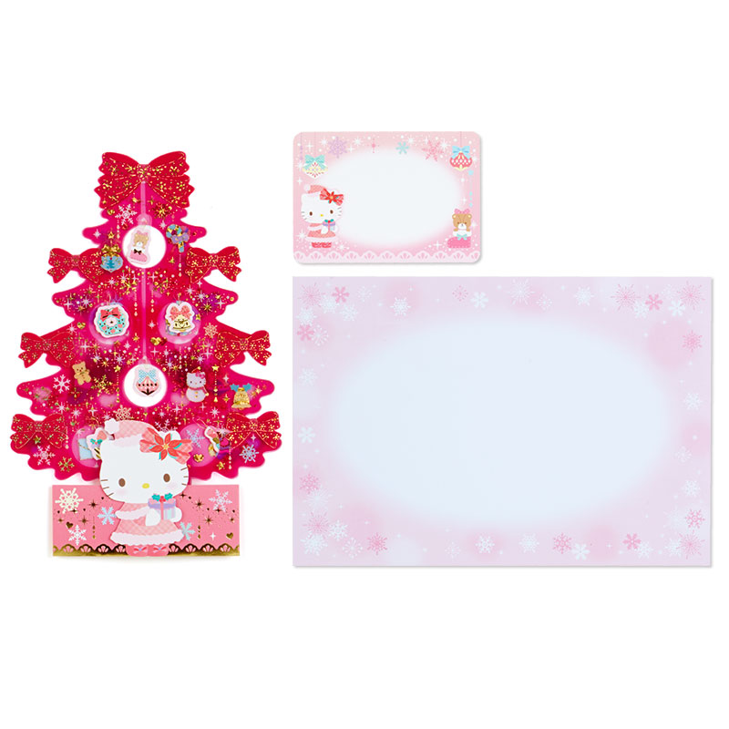 Sanrio Christmas Pop Up Card From Japan การ์ดอวยพรลาย Hello Kitty สีชมพู ทำจากพลาสติกแข็งใส กางออกมาเป็นต้นคริสต์มาสได้น่ารัก มีการ์ดกระดาษที่ไว้เขียนแนบมาให้ ขนาด 14.5 x 0.5 x 21.5 ซม.