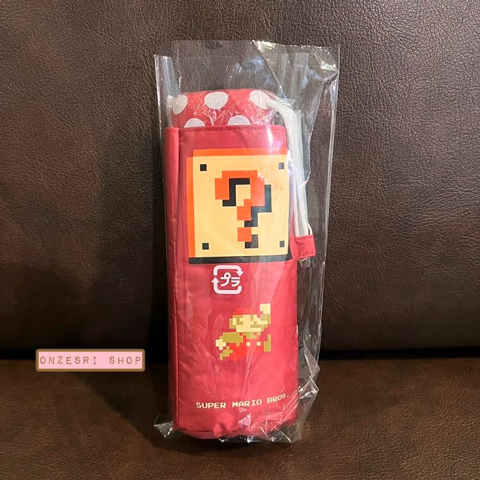ร่มพับ Wpc. รุ่น Super Mario Bros. Parasol Mini แบบสีแดง ป้องกัน UV 100% ป้องกันคลื่นความร้อน กันฝน ขนาด สูง 48 ซม. กว้าง 85 ซม. พับแล้วเหลือ 16 ซม. น้ำหนัก 185g ทำจากผ้าสังเคราะห์ (PU coating)