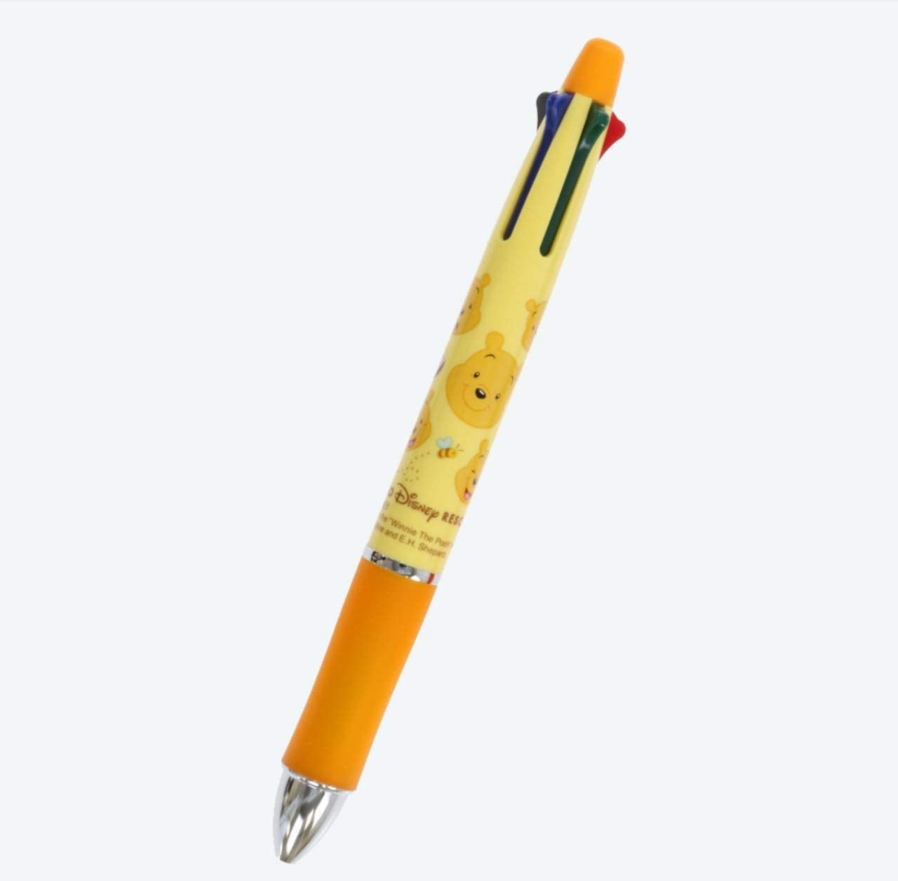ปากกา Dr.Grip 4+1 ลาย Winnie the Pooh สีเหลือง เป็นปากกาหมึก 4 สี ดำ แดง เขียว น้ำเงิน และเป็นดินสอกดในแท่งเดียวกัน มีขายเฉพาะที่ Tokyo Disney Resort เท่านั้น