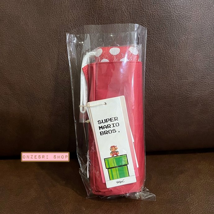 ร่มพับ Wpc. รุ่น Super Mario Bros. Parasol Mini แบบสีแดง ป้องกัน UV 100% ป้องกันคลื่นความร้อน กันฝน ขนาด สูง 48 ซม. กว้าง 85 ซม. พับแล้วเหลือ 16 ซม. น้ำหนัก 185g ทำจากผ้าสังเคราะห์ (PU coating)
