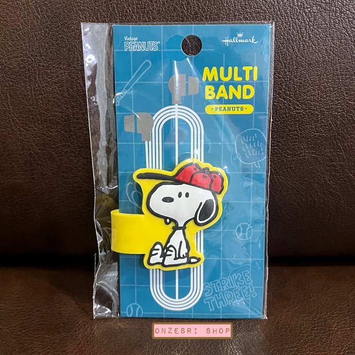 Snoopy Peanuts Multi Band แบบสีเหลือง ขนาด 4.6 x 9.2 x 0.5 ซม. ทำจาก PVC ใช้พันสาย เก็บสายต่าง ๆ ได้