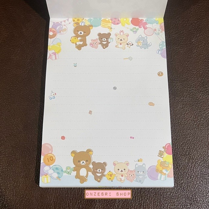 สมุดฉีก Rilakkuma Niko Niko Happy for You แบบสีเหลืองทอง ขนาด 14.8 x 10.5 ซม. มี 4 ลาย รวม 100 แผ่น