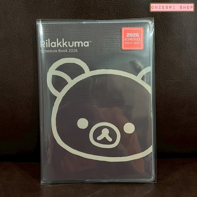 สมุด 2026 Schedule Book เล่มกลาง B6 ลาย Rilakkuma สีดำ ขนาด 18.6 x 13.2 x 0.6 ซม. (64 หน้า) มีให้จดตั้งแต่เดือน 10/2025 - 3/2027 เป็นปฎิทินแบบ monthly ช่องกลาง