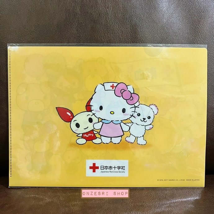 แฟ้ม A4 Hello Kitty x Japanese Red Cross Society (Limited) แบบ Nurse Kitty x Kenketsuchan x CroKuma สีเหลือง เป็นของที่ทาง Sanrio Japan ทำร่วมกับสภากาชาดญี่ปุ่น ไม่มีขายทั่วไป