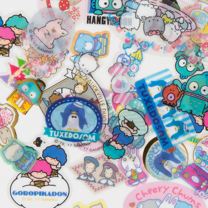 Sticker รวม Sanrio ยุค 80 ขนาด 11 x 7.2 x 0.4 ซม. เป็นแบบฟอยล์ทอง มีเคสใส่ สีชมพู รวม 45 ชิ้น