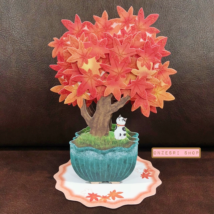 Autumn Pop Up Card จาก Hallmark Japan การ์ดเปล่าแบบน้องแมวญี่ปุ่นกับต้นบอนไซใบสีส้ม มีกากเพชร กางตั้งได้ ด้านล่างเขียนได้ มาพร้อมซอง ขนาด 16.8 x 11.4 ซม.