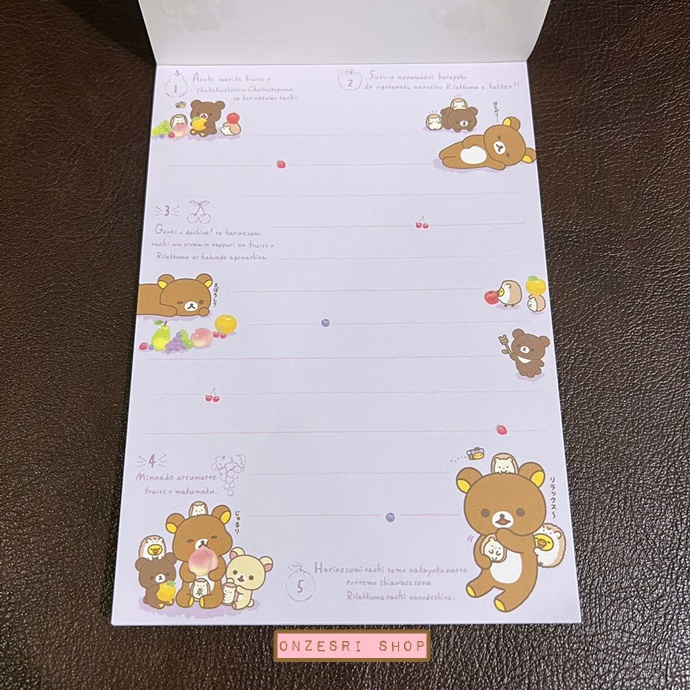 สมุดฉีก Rilakkuma Fruits แบบสีขาว ขนาด 14.8 x 10.5 ซม. มี 4 ลาย รวม 100 แผ่น