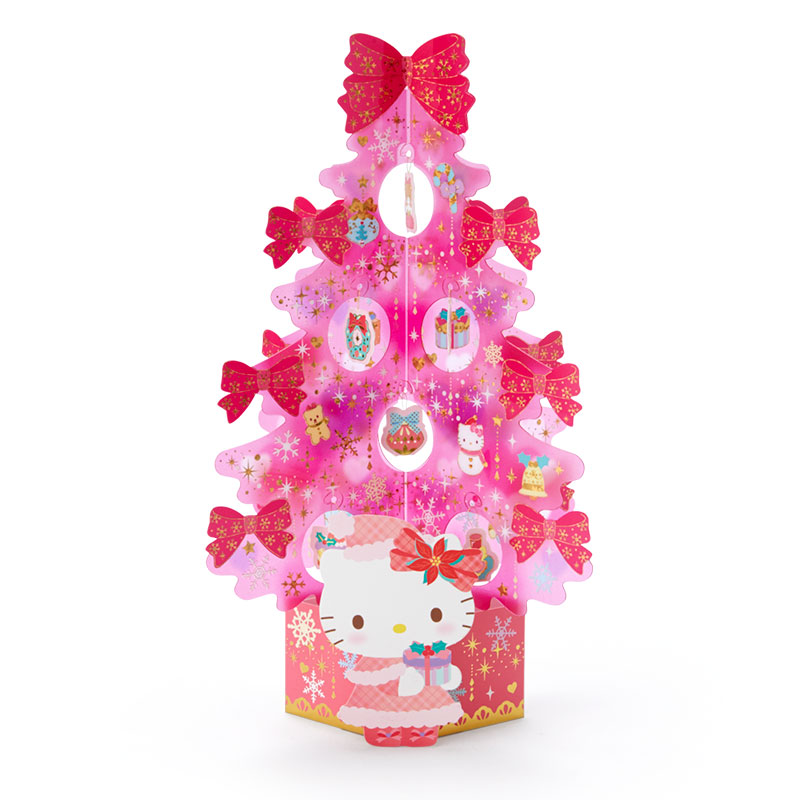 Sanrio Christmas Pop Up Card From Japan การ์ดอวยพรลาย Hello Kitty สีชมพู ทำจากพลาสติกแข็งใส กางออกมาเป็นต้นคริสต์มาสได้น่ารัก มีการ์ดกระดาษที่ไว้เขียนแนบมาให้ ขนาด 14.5 x 0.5 x 21.5 ซม.