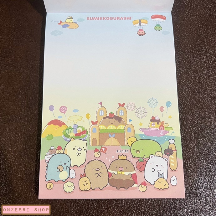 สมุดฉีก Sumikko Gurashi Welcome! Food Oukoku แบบขอบสีชมพู ขนาด 14.8 x 10.5 ซม. มี 4 ลาย รวม 100 แผ่น