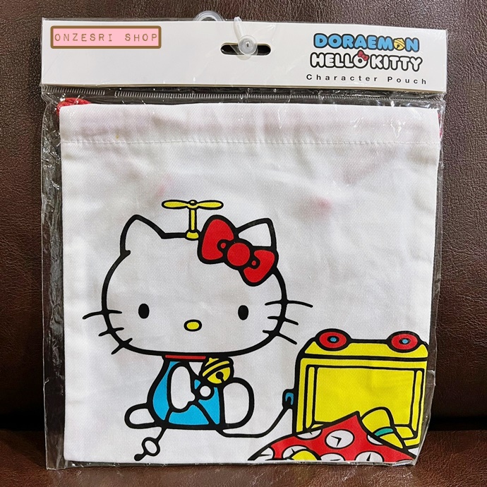 กระเป๋ารูดเชือก Doraemon meets Hello kitty ขนาด 20 x 20 ซม.