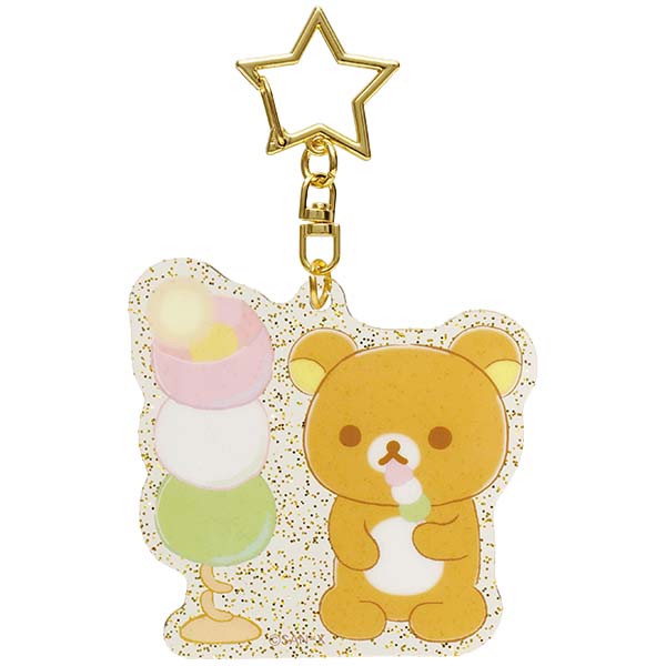 พวงกุญแจอะคริลิค Rilakkuma Lovely House (Limited) แบบห่วงรูปดาว ขนาด 7 x 5 ซม. ด้านหลังเป็นแบบกลิตเตอร์สีทอง แบบ Rilakkuma Dango ไม่มีขายทั่วไป เป็นแบบต้องลุ้นกับทางหน้าร้าน San-X ที่ญี่ปุ่นเท่านั้น