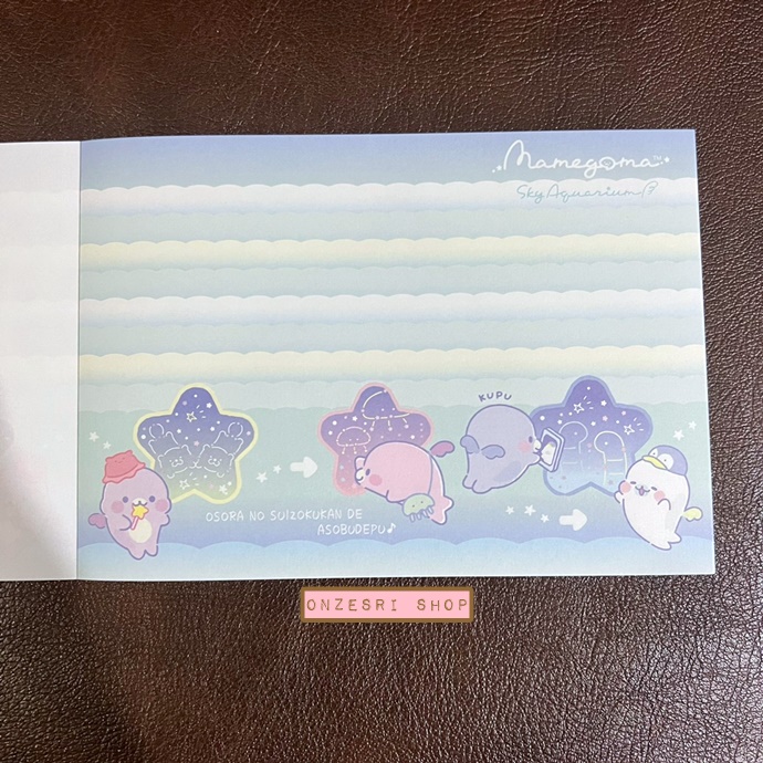 สมุดฉีก Mamegoma Sky Aquarium ลายสีม่วง ขนาด 14.8 x 10.5 ซม. มี 4 ลาย รวม 100 แผ่น