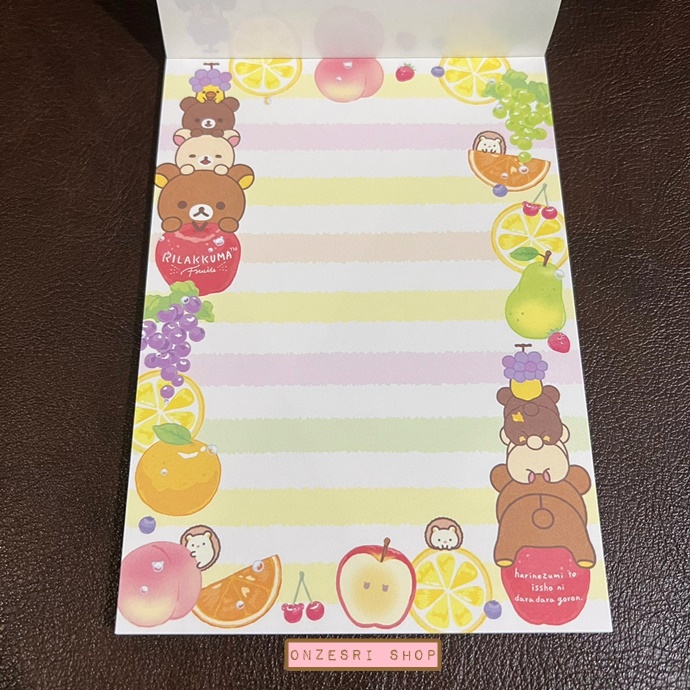 สมุดฉีก Rilakkuma Fruits แบบสีขาว ขนาด 14.8 x 10.5 ซม. มี 4 ลาย รวม 100 แผ่น