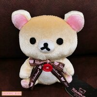 ตุ๊กตา Korilakkuma ขนสีครีมทองวิ้ง โบว์สีน้ำตาล แบบนั่ง ขนาด 12 x 10 ซม.