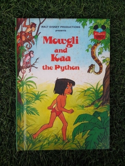 WALT DISNEY PRODUCTIONS : Mowgli and Kaa the Python