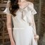 Nella Ruffle Shoulder Dress - สีครีม
