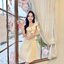 Esme Ruffle Dress : เดรสเว้าไหล่สีครีม