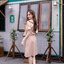 Esme Ruffle Dress : เดรสเว้าไหล่สีโอวัลติน