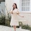 Rory open shoulder dress : สีครีม