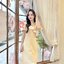 Esme Ruffle Dress : เดรสเว้าไหล่สีครีม