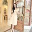 Esme Ruffle Dress : เดรสเว้าไหล่สีครีม