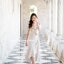 Nella Ruffle Shoulder Dress - สีครีม